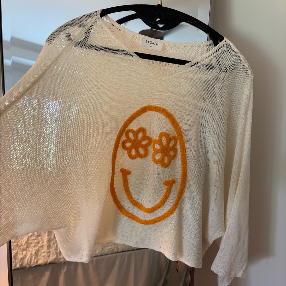 Storia Cream Knit Top with Orange Smiley